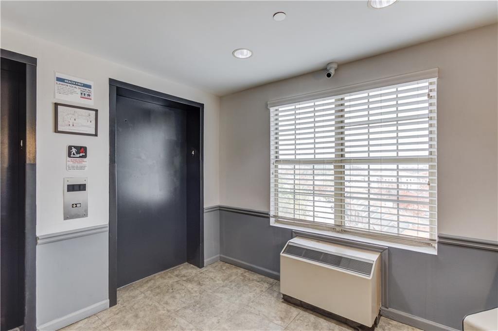 970 Sidney Marcus Boulevard Northeast, Unit 2403 Atlanta, GA 30324 - Photo 28 of 41 a view of an empty room with a window