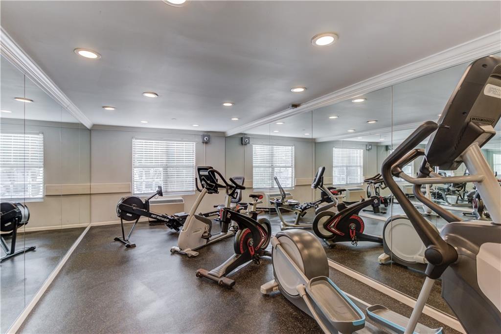 970 Sidney Marcus Boulevard Northeast, Unit 2403 Atlanta, GA 30324 - Photo 31 of 41 a view of a room with gym equipment