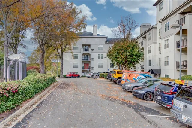 a view of a building with a yard