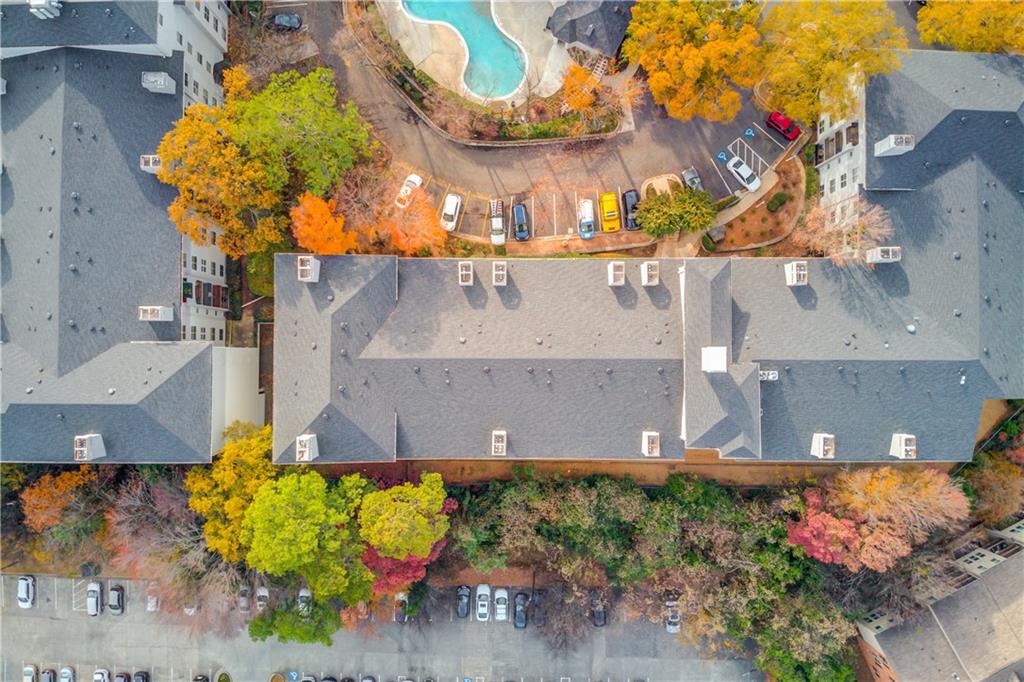 970 Sidney Marcus Boulevard Northeast, Unit 2403 Atlanta, GA 30324 - Photo 38 of 41 an aerial view of a house with a swimming pool