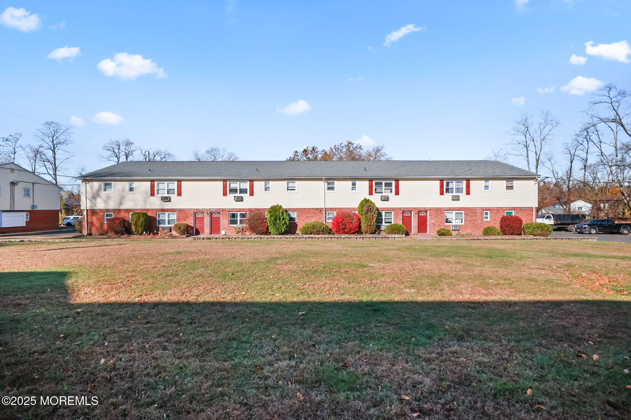 175 Buckelew Avenue, Unit BLDG 2 14 Jamesburg, NJ 08831 - Photo 1 of 31 a view of street with houses
