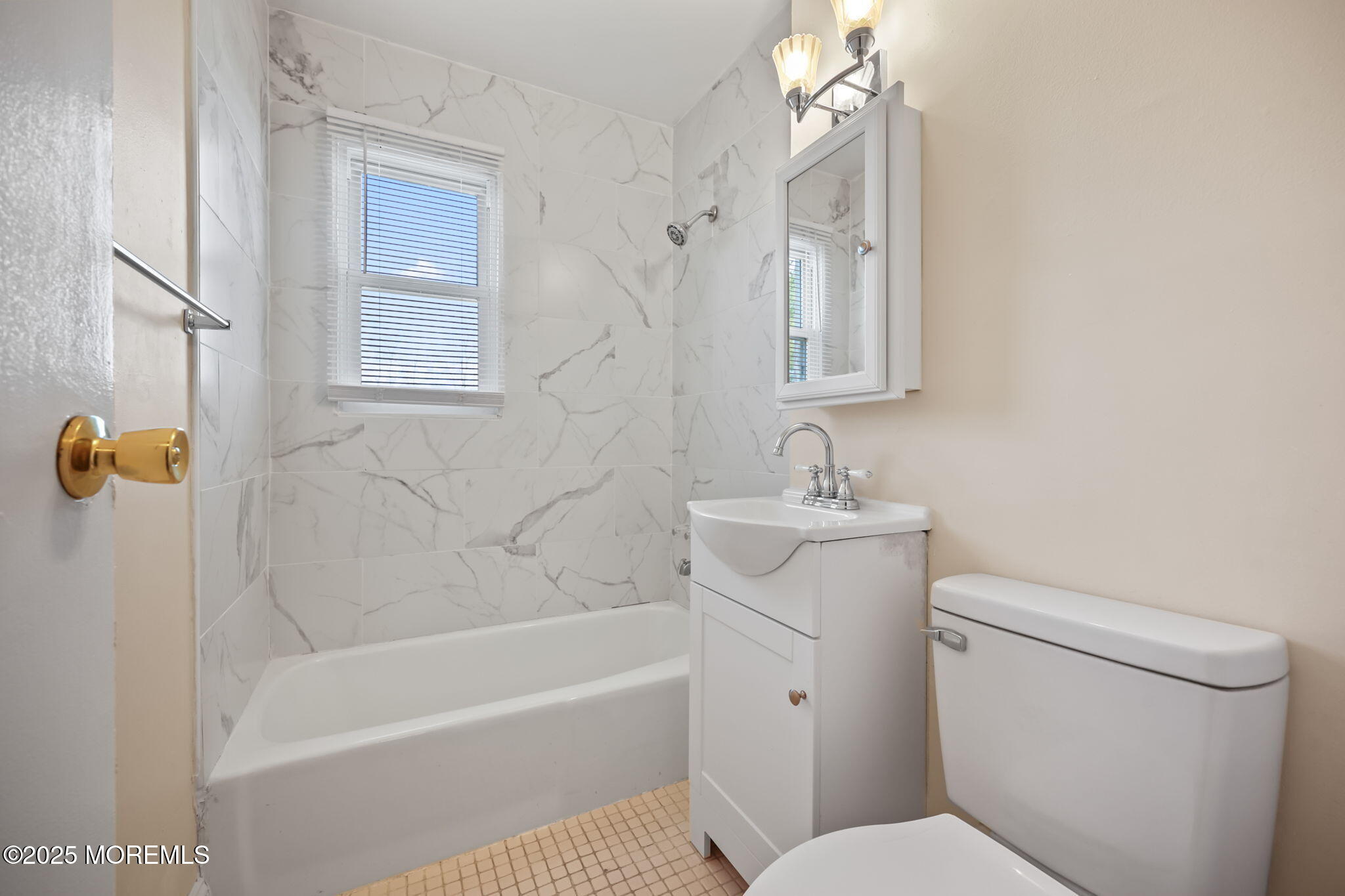 175 Buckelew Avenue, Unit BLDG 2 14 Jamesburg, NJ 08831 - Photo 16 of 31 a bathroom with a sink a toilet and shower