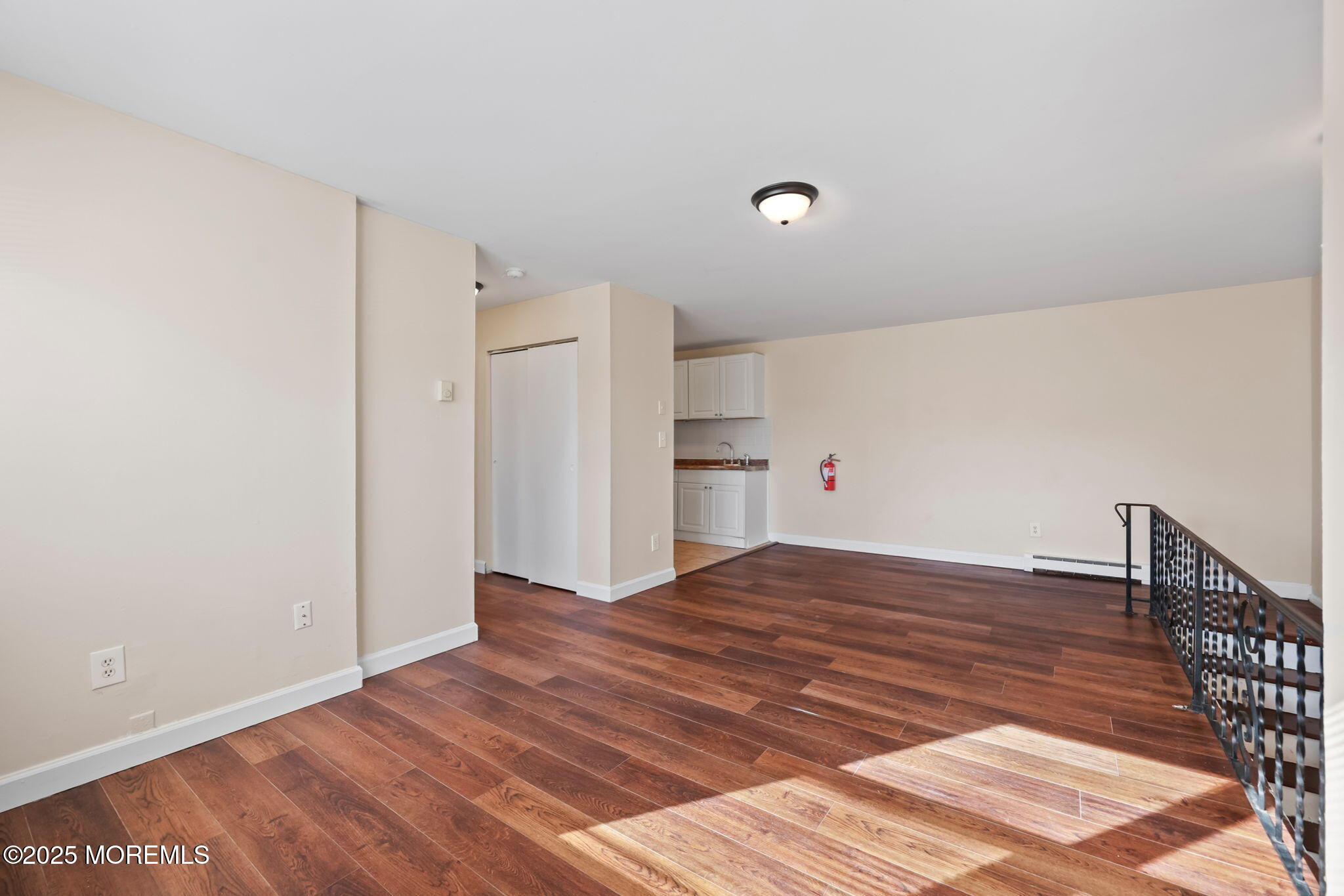 175 Buckelew Avenue, Unit BLDG 2 14 Jamesburg, NJ 08831 - Photo 29 of 31 a view of empty room with wooden floor