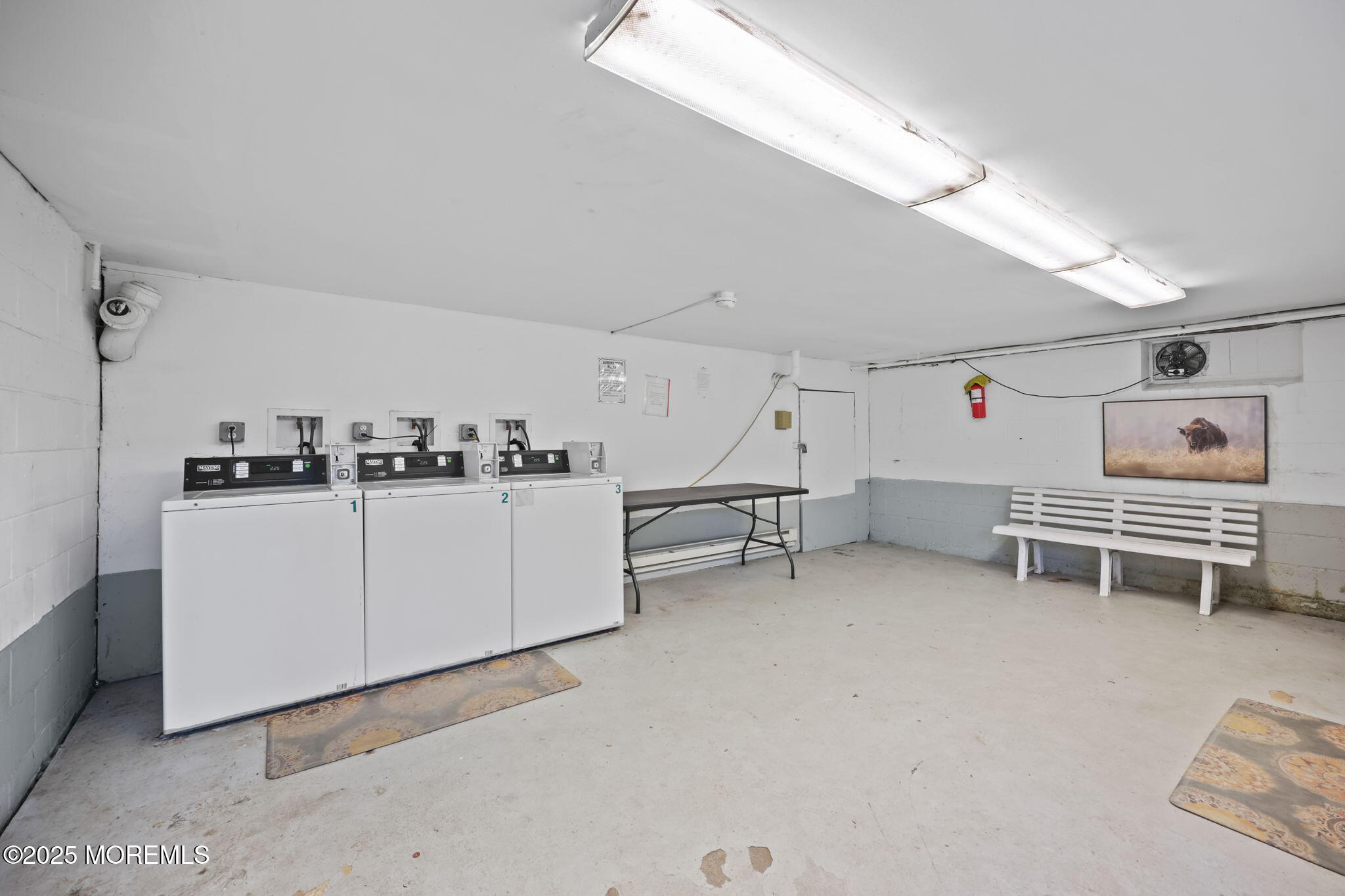 175 Buckelew Avenue, Unit BLDG 2 14 Jamesburg, NJ 08831 - Photo 31 of 31 a room with furniture and white walls