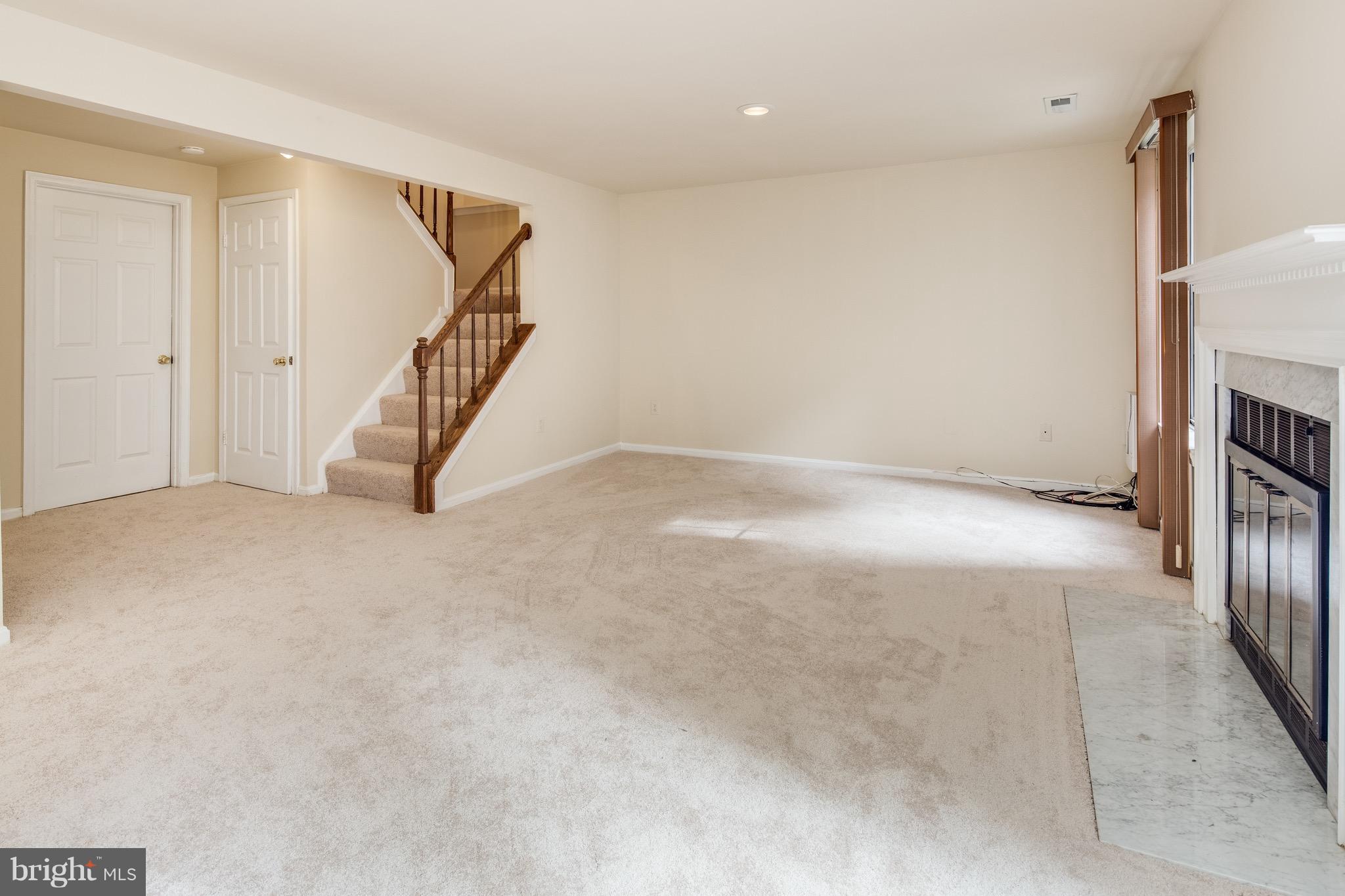 15005 Shamrock Ridge Road Silver Spring, MD 20906 - Photo 19 of 25 Family room in Basement with fireplace