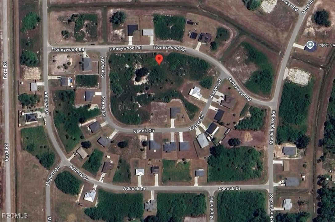 3016 Honeywood Road LaBelle, FL 33935 - Photo 4 of 4 an aerial view of multiple house