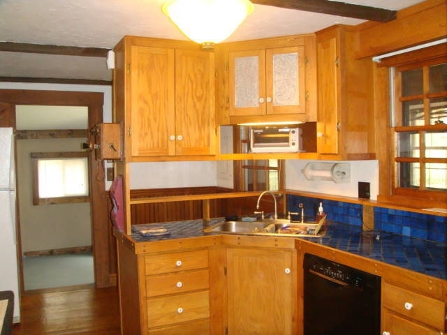 2240 Webb Mountain Road Boones Mill, VA 24065 - Photo 35 of 52 kitchen to utility