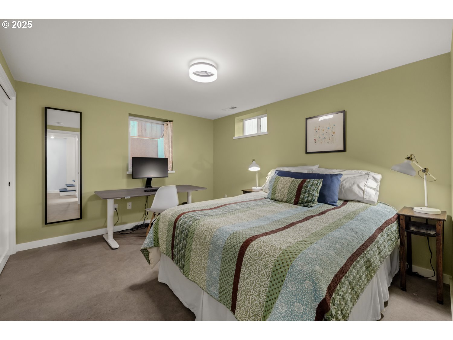 4016 Southeast Cora Street Portland, OR 97202 - Photo 25 of 30 a bedroom with a bed and a desk