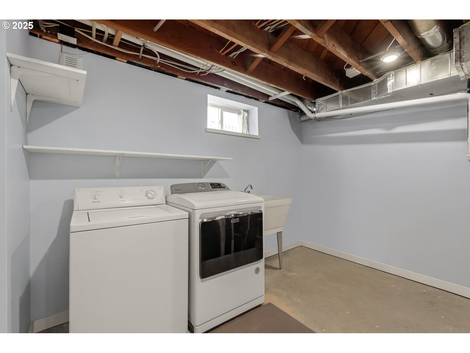 4016 Southeast Cora Street Portland, OR 97202 - Photo 27 of 30 a utility room with dryer and washer