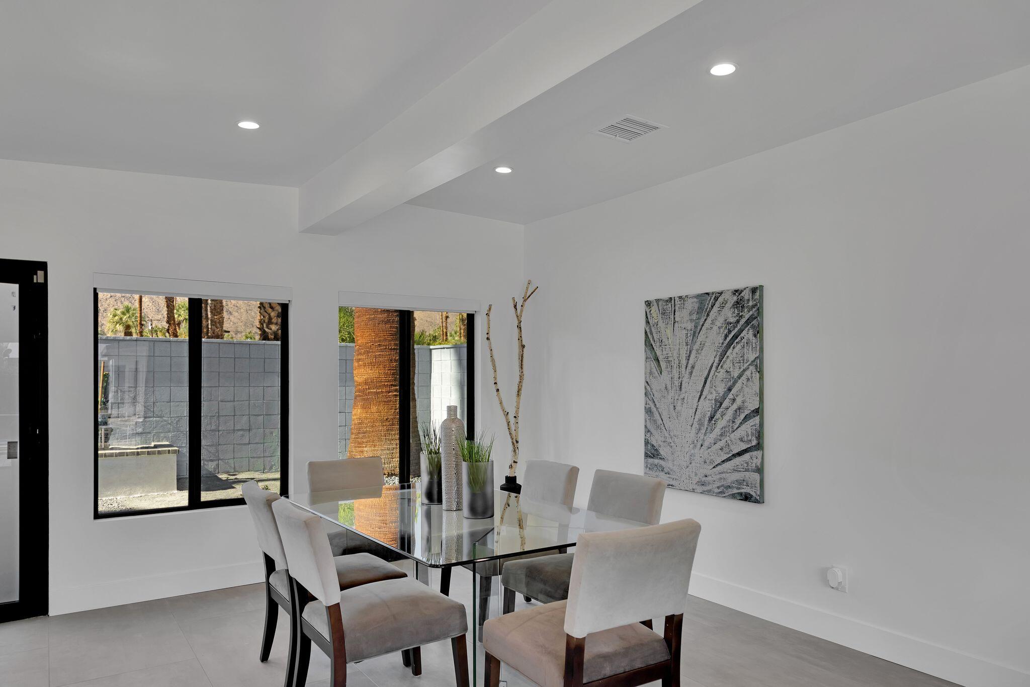 690 South Grenfall Road Palm Springs, CA 92264 - Photo 14 of 92 a view of a dining room with furniture and window