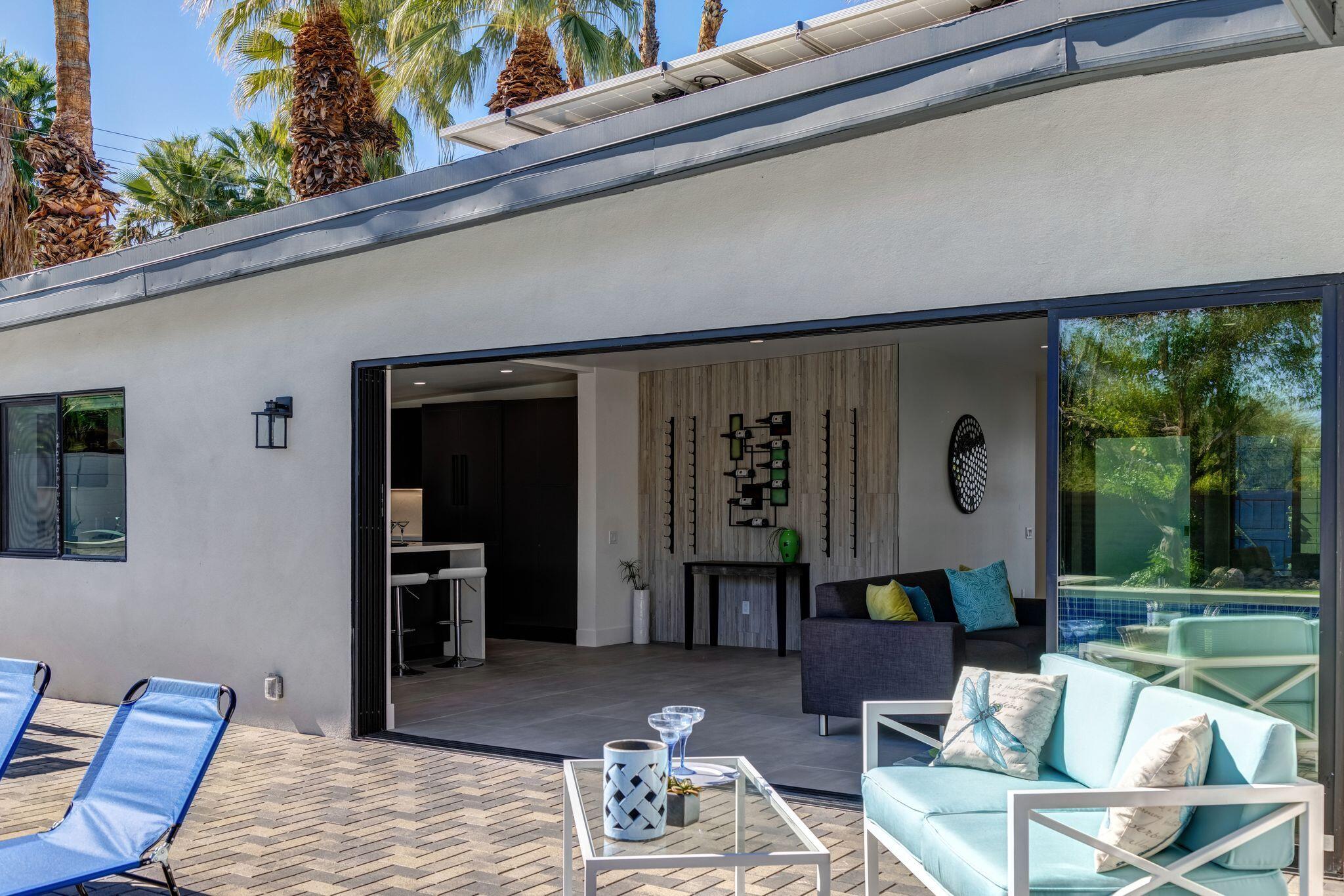 690 South Grenfall Road Palm Springs, CA 92264 - Photo 27 of 92 a outdoor living space with furniture and garden view
