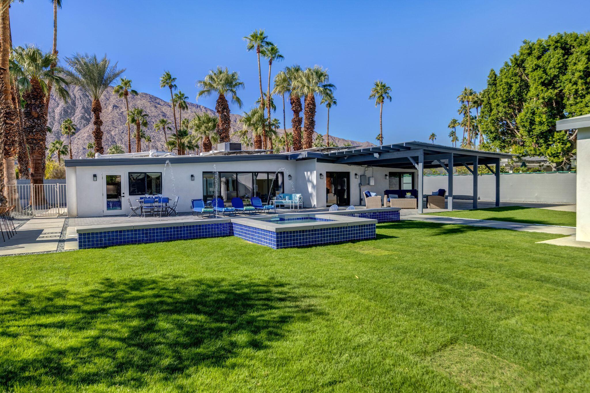 690 South Grenfall Road Palm Springs, CA 92264 - Photo 38 of 92 a house view with swimming pool and garden space