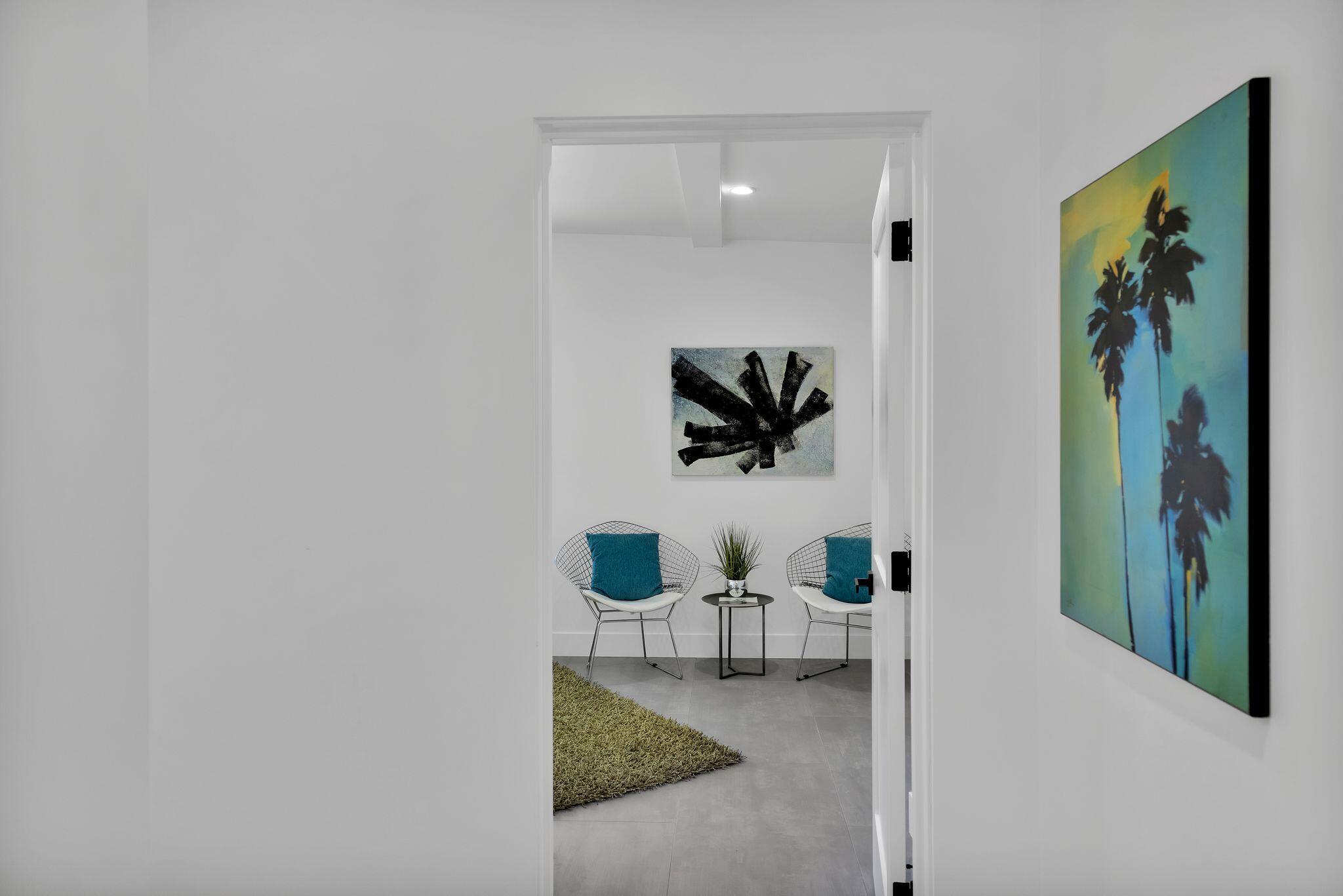 690 South Grenfall Road Palm Springs, CA 92264 - Photo 61 of 92 a living room with furniture and a flat screen tv