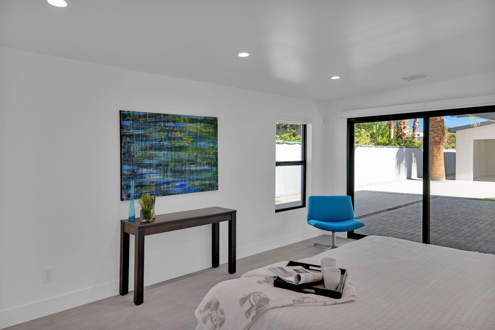 690 South Grenfall Road Palm Springs, CA 92264 - Photo 62 of 92 a bedroom with furniture and a window
