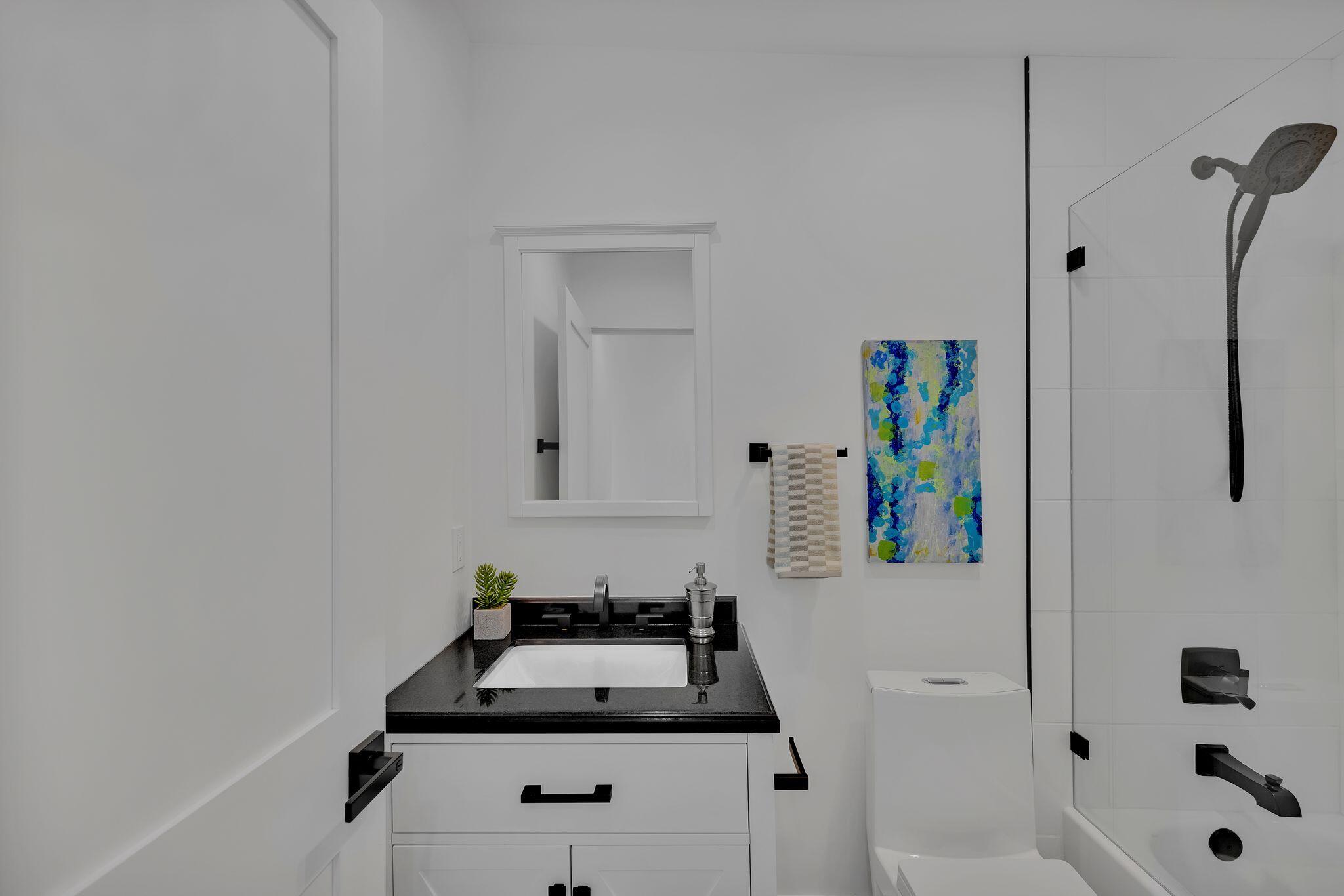690 South Grenfall Road Palm Springs, CA 92264 - Photo 64 of 92 a bathroom with a sink and a bathtub