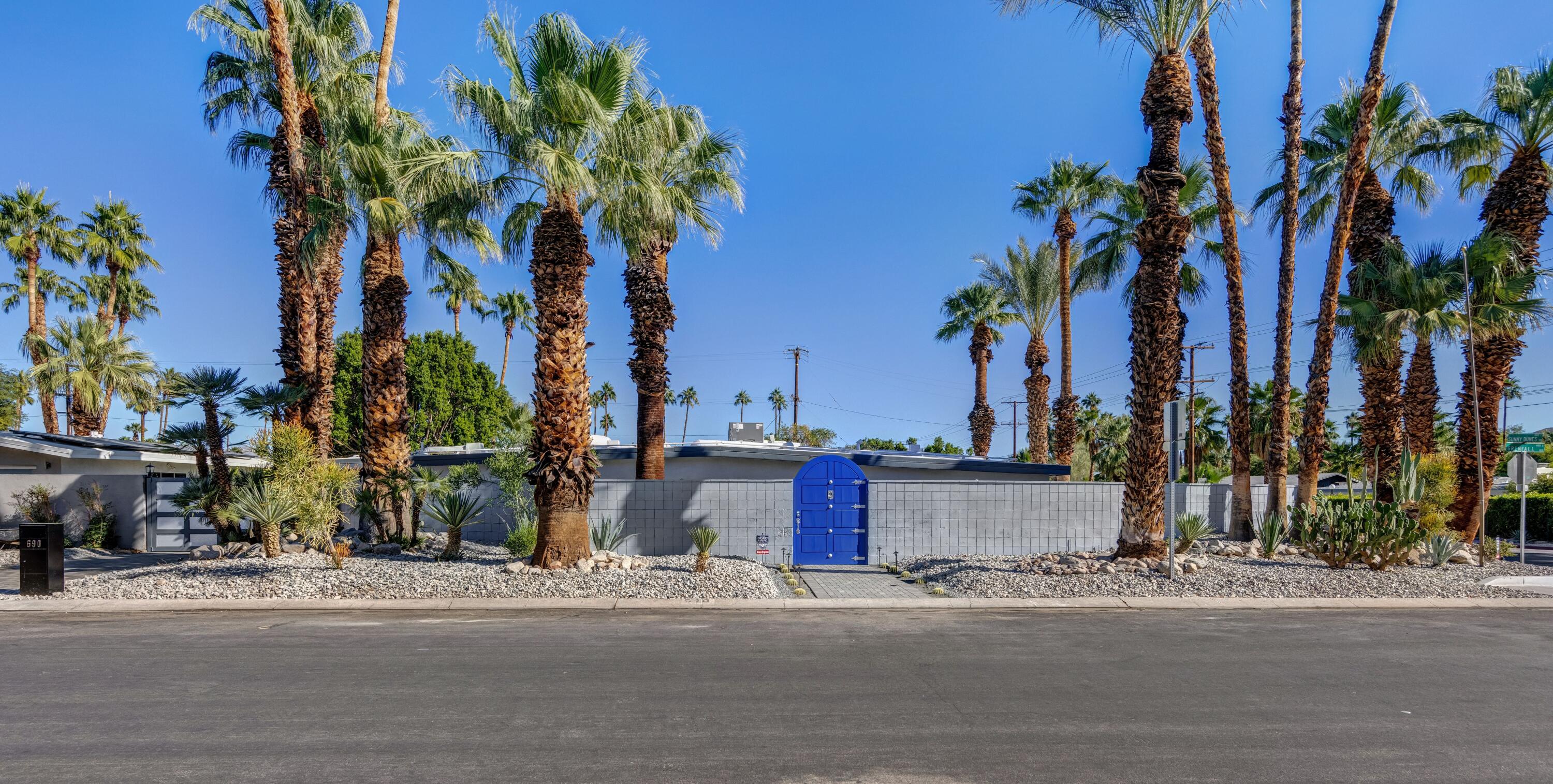 690 South Grenfall Road Palm Springs, CA 92264 - Photo 69 of 92 front view of a house with a palm tree