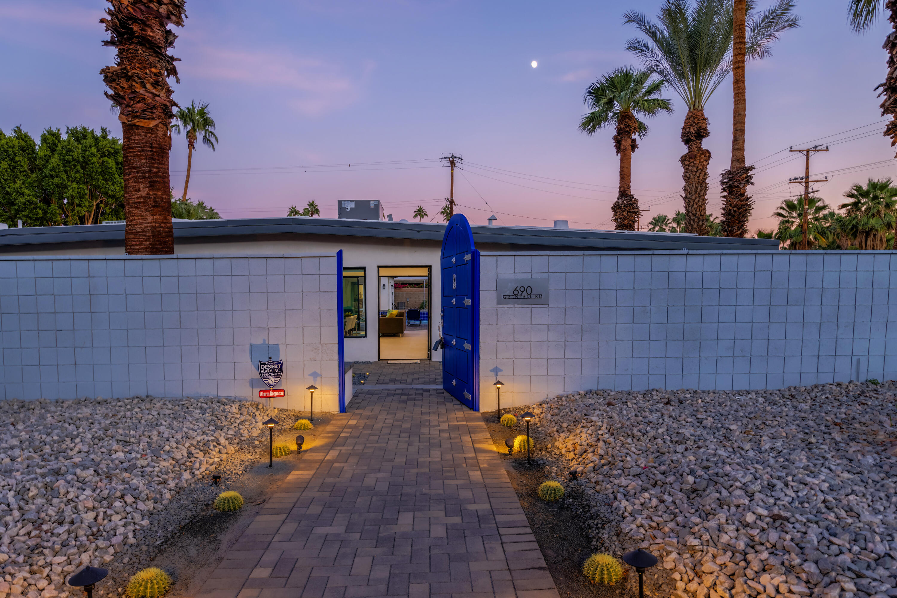 690 South Grenfall Road Palm Springs, CA 92264 - Photo 72 of 92 a front view of a house with a yard