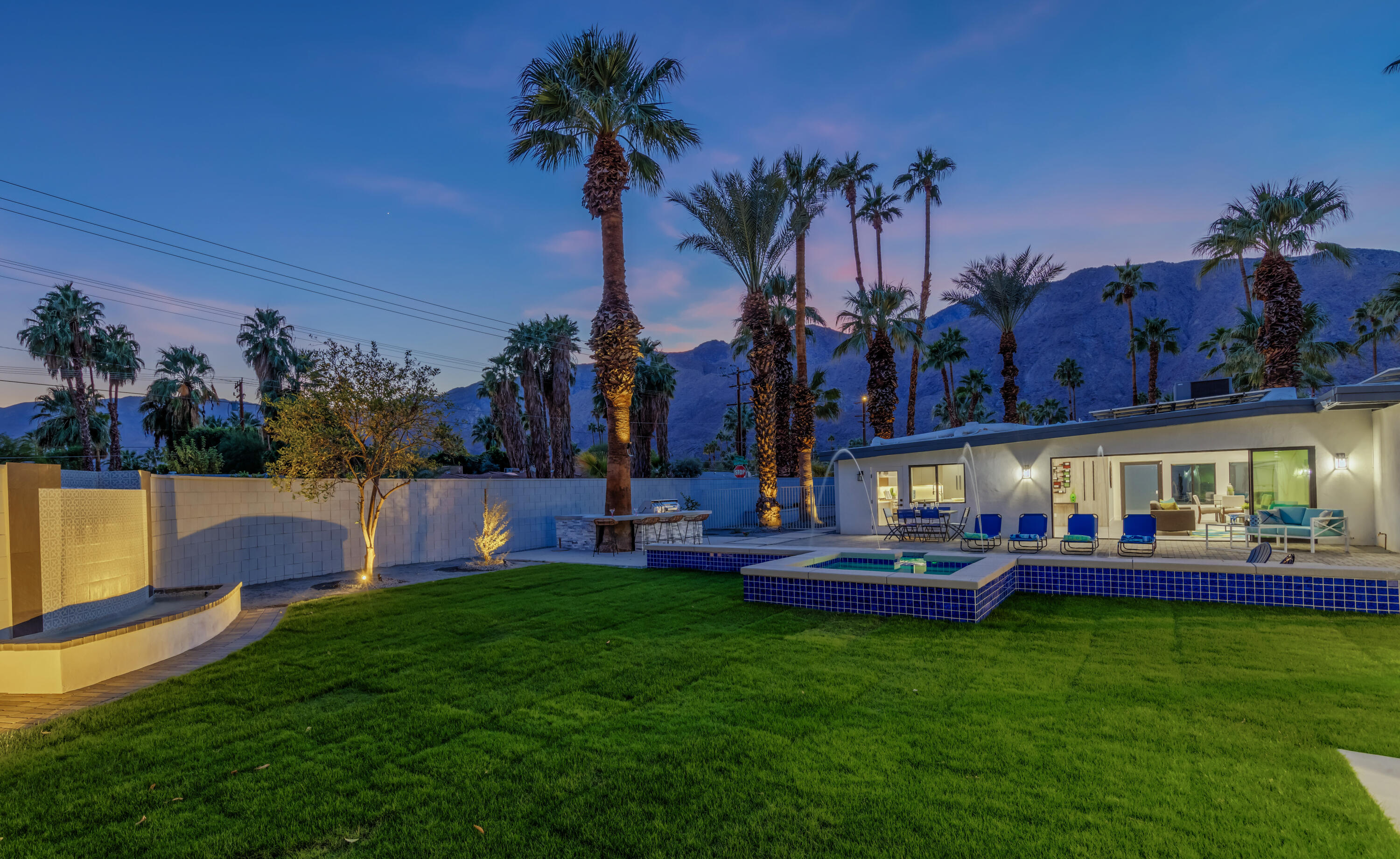 690 South Grenfall Road Palm Springs, CA 92264 - Photo 77 of 92 a view of a house with a backyard and porch