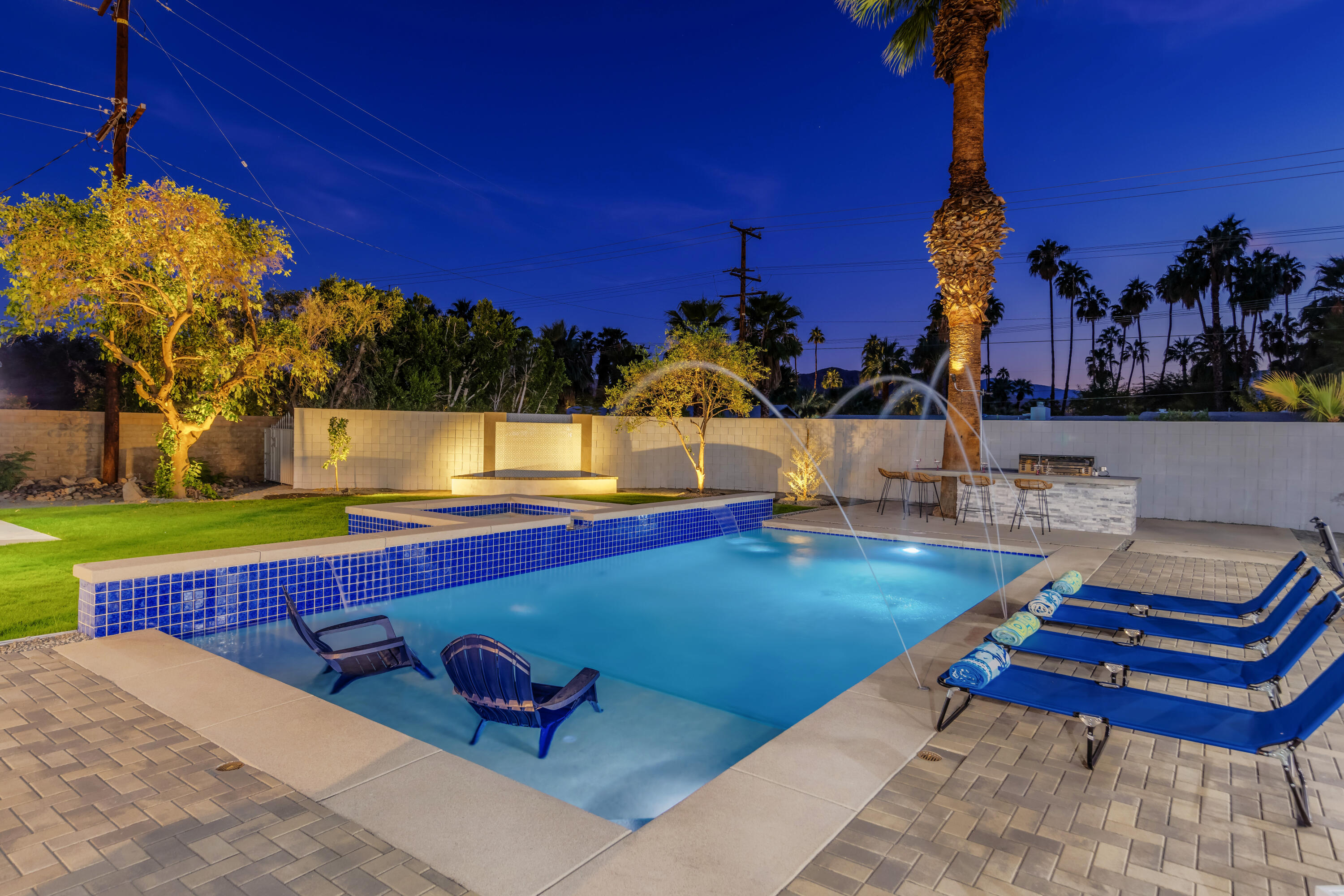 690 South Grenfall Road Palm Springs, CA 92264 - Photo 88 of 92 a swimming pool with outdoor seating and yard