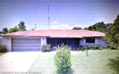 356 Lime Road Northwest Lake Placid, FL 33852 - Photo 1 of 1 a front view of a house with a yard