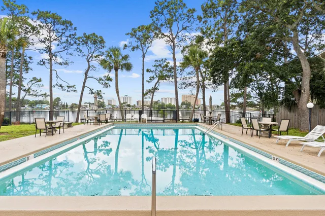 a view of swimming pool with seating