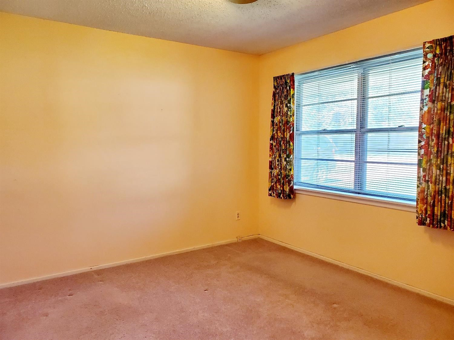 5419 46th Street Lubbock, TX 79414 - Photo 21 of 36 an empty room with windows