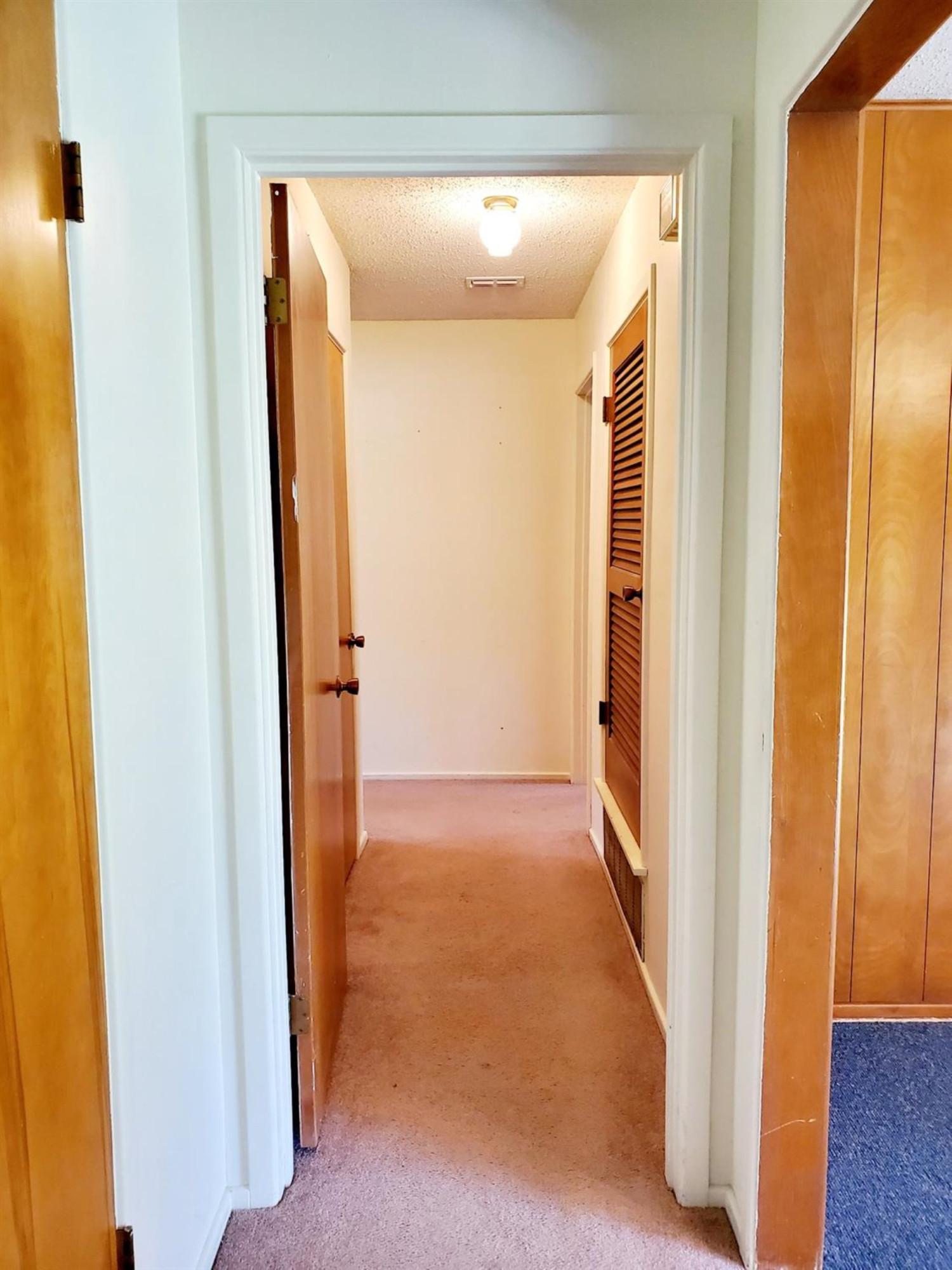 5419 46th Street Lubbock, TX 79414 - Photo 7 of 36 a view of a hallway with wooden floor
