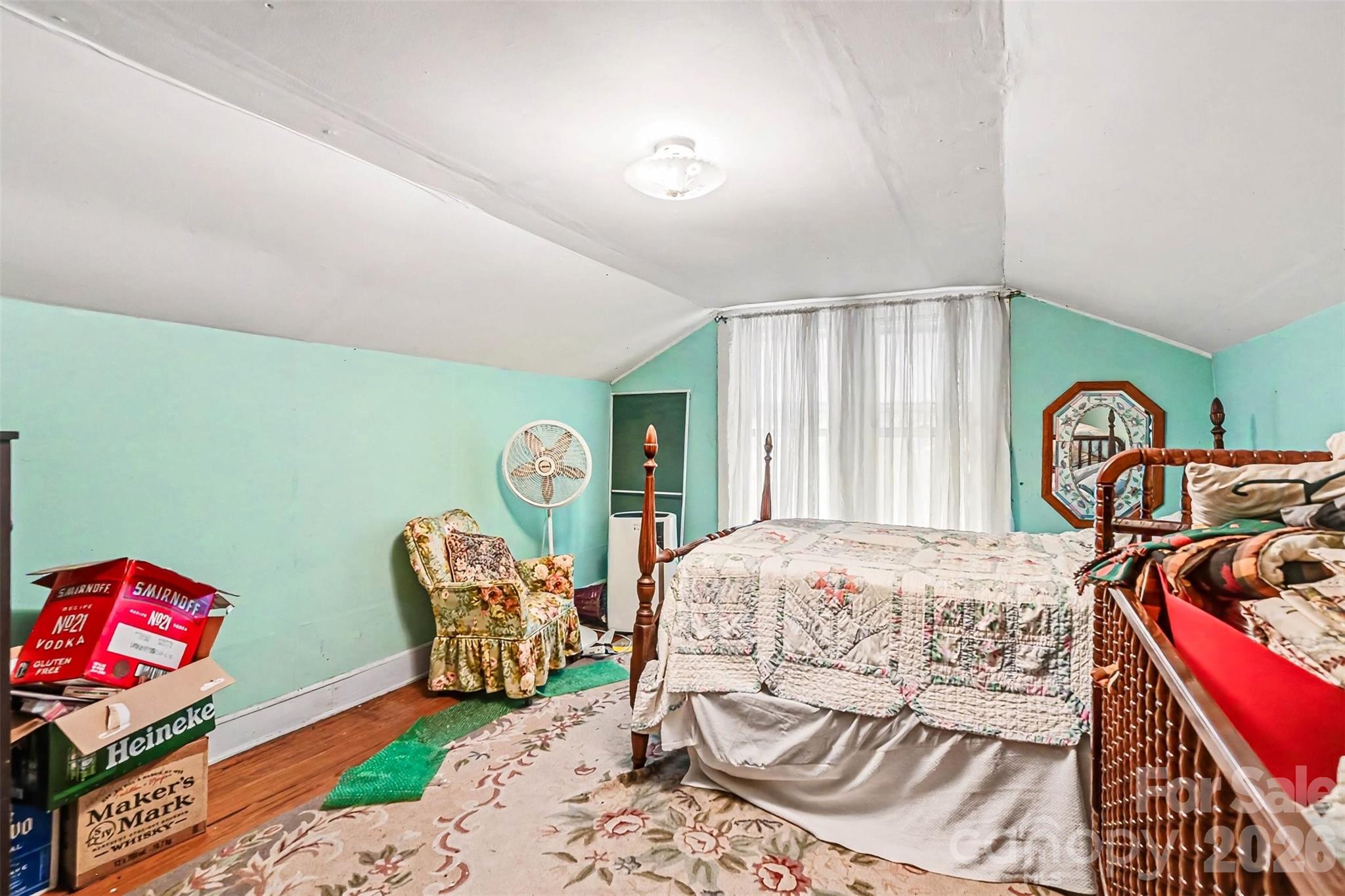 1116 Medlin Road Monroe, NC 28112 - Photo 9 of 40 a bedroom with furniture and a window