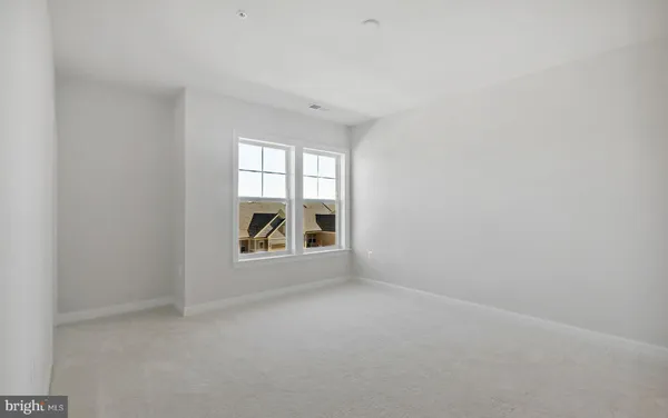 a bathroom with a sink vanity and a mirror