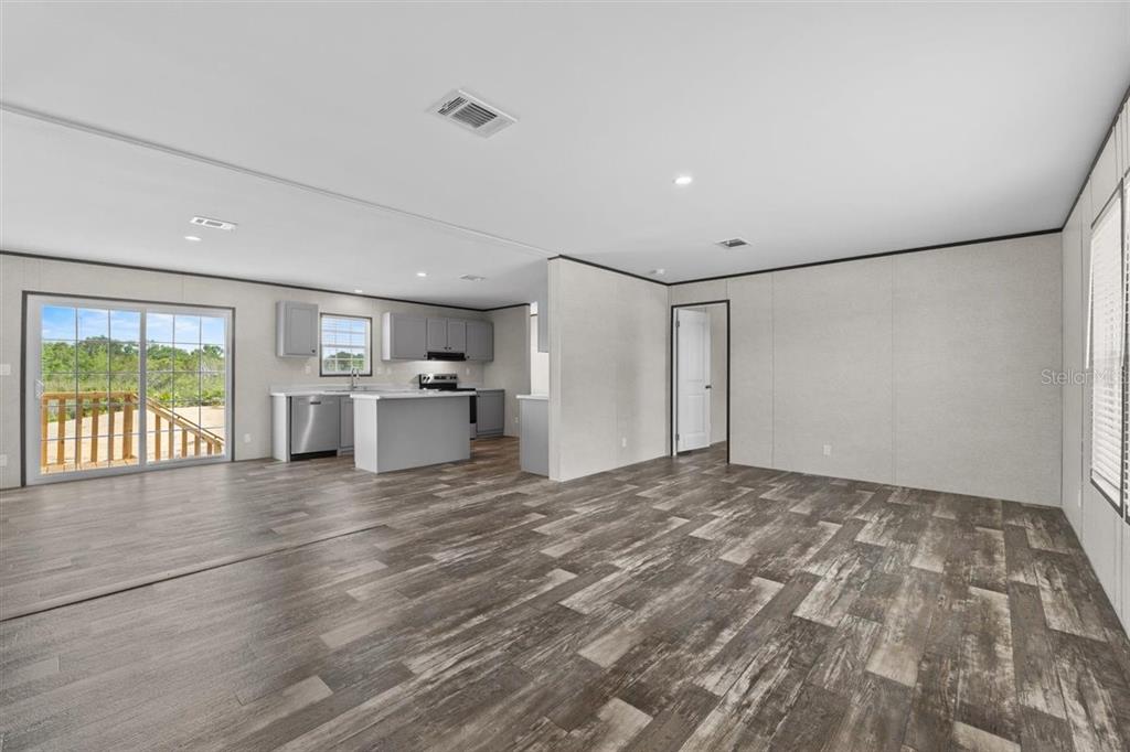 0 Rose Trail Hawthorne, FL 32640 - Photo 11 of 36 a view of a livingroom with wooden floor