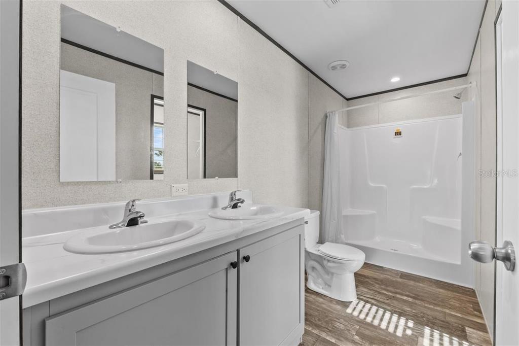 0 Rose Trail Hawthorne, FL 32640 - Photo 24 of 36 a bathroom with a sink a toilet and shower