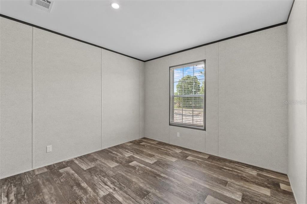 0 Rose Trail Hawthorne, FL 32640 - Photo 27 of 36 a view of an empty room with a window