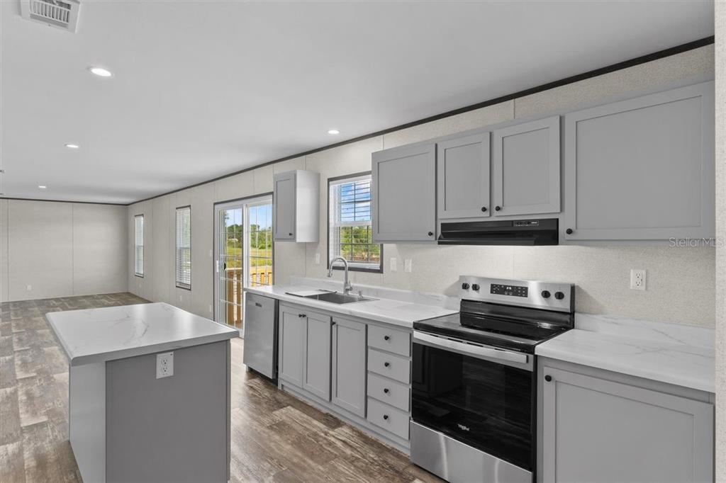 0 Rose Trail Hawthorne, FL 32640 - Photo 3 of 36 a kitchen that has a sink and a stove in it