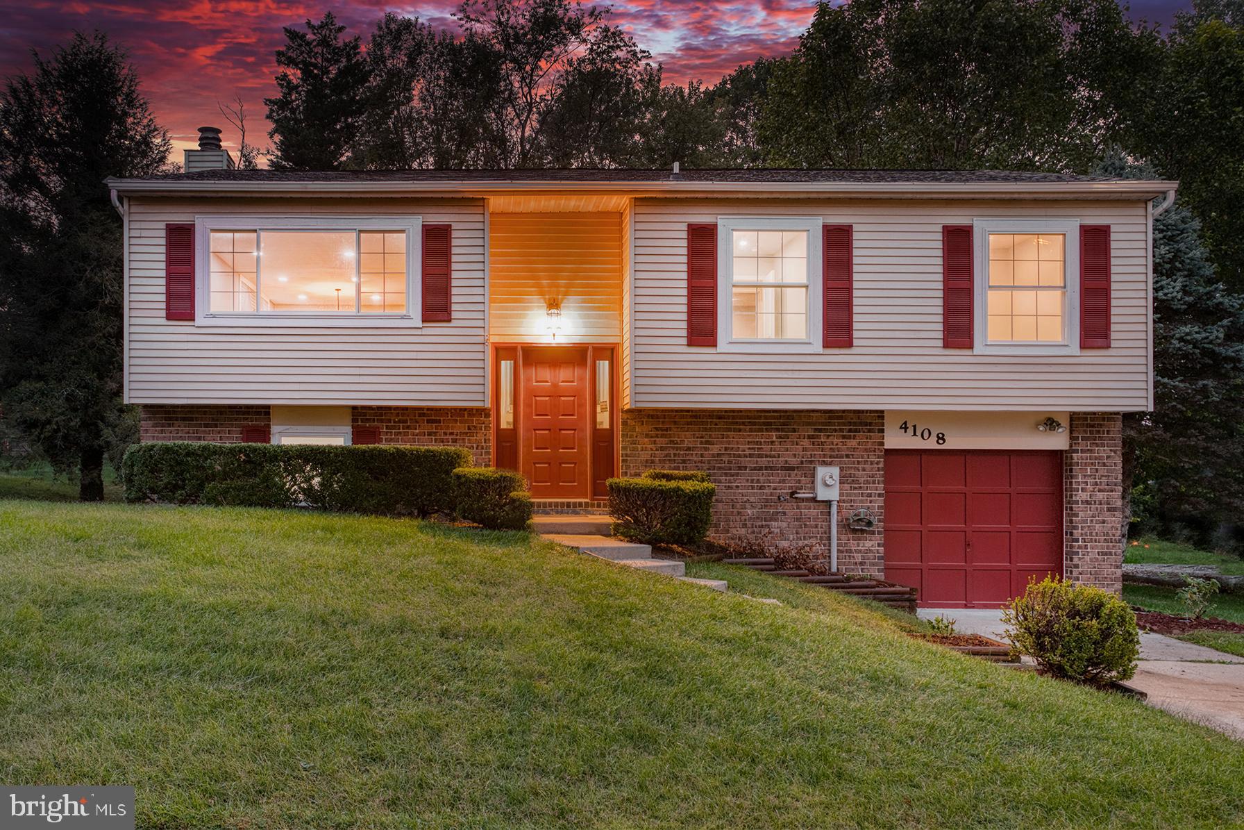 4108 Century Towne Road Randallstown, MD 21133 - Photo 1 of 51 a front view of a house with a yard
