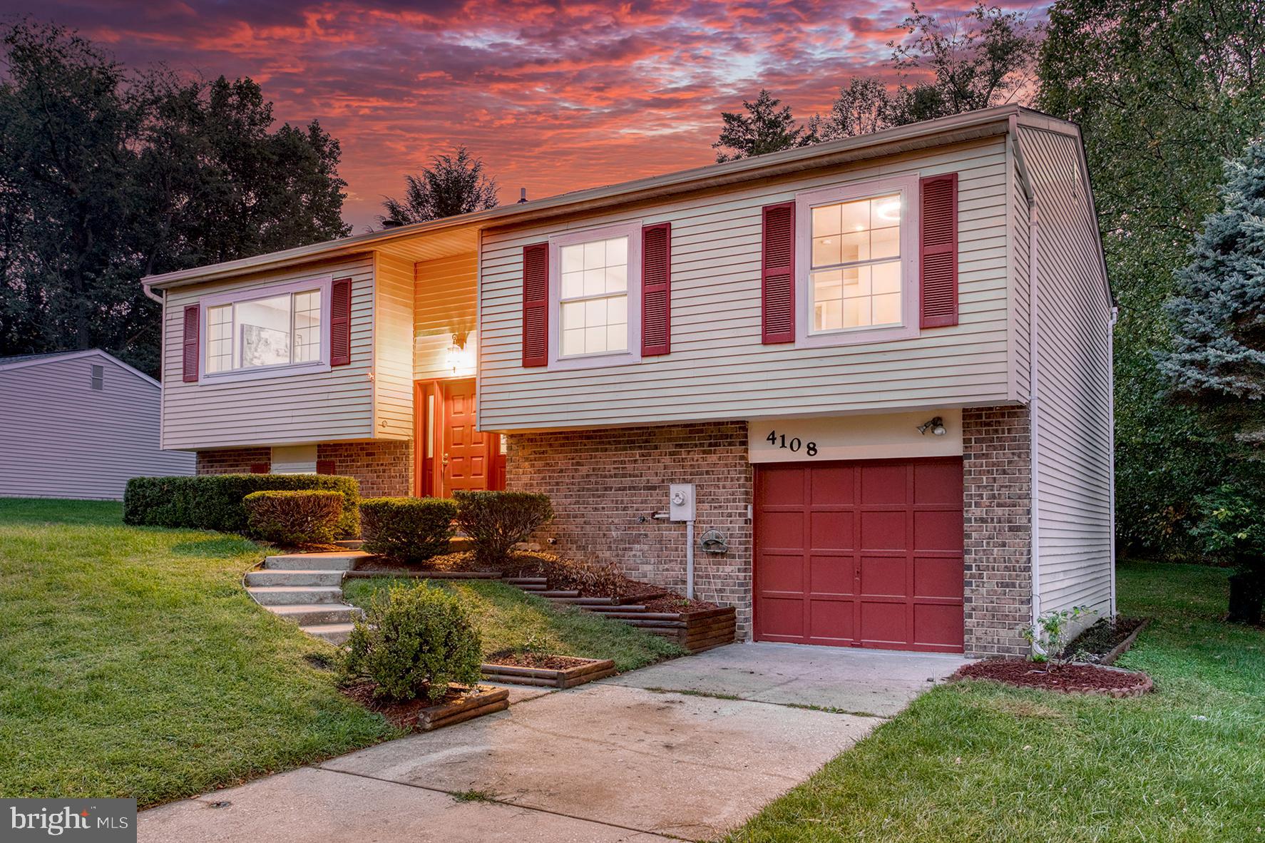 4108 Century Towne Road Randallstown, MD 21133 - Photo 2 of 51 a front view of a house with a yard