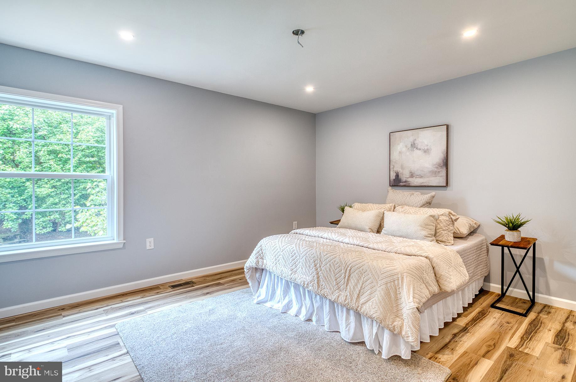 4108 Century Towne Road Randallstown, MD 21133 - Photo 21 of 51 a bedroom with a bed and a window