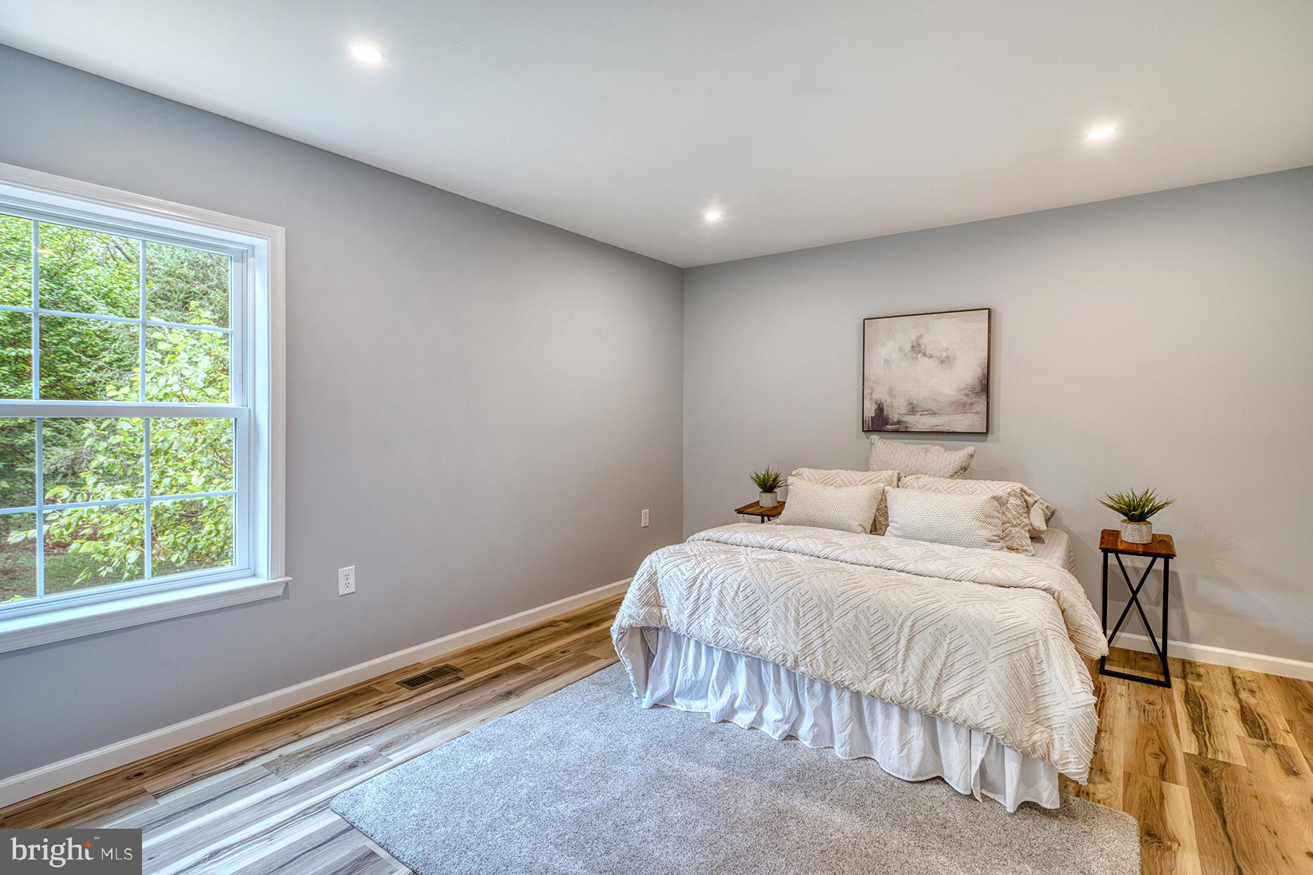 4108 Century Towne Road Randallstown, MD 21133 - Photo 23 of 51 a bedroom with a bed and a window