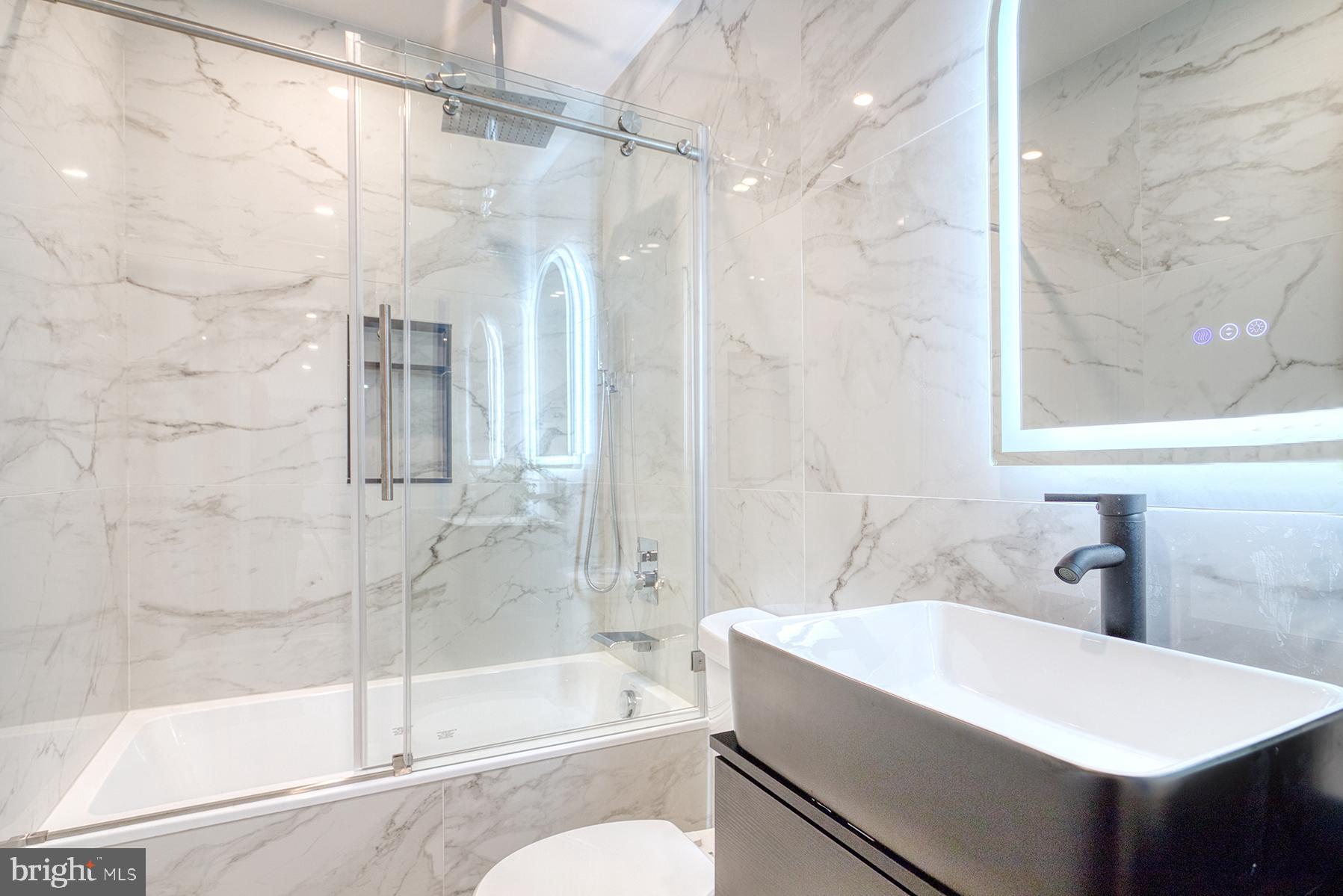 4108 Century Towne Road Randallstown, MD 21133 - Photo 25 of 51 a bathroom with a shower and a sink