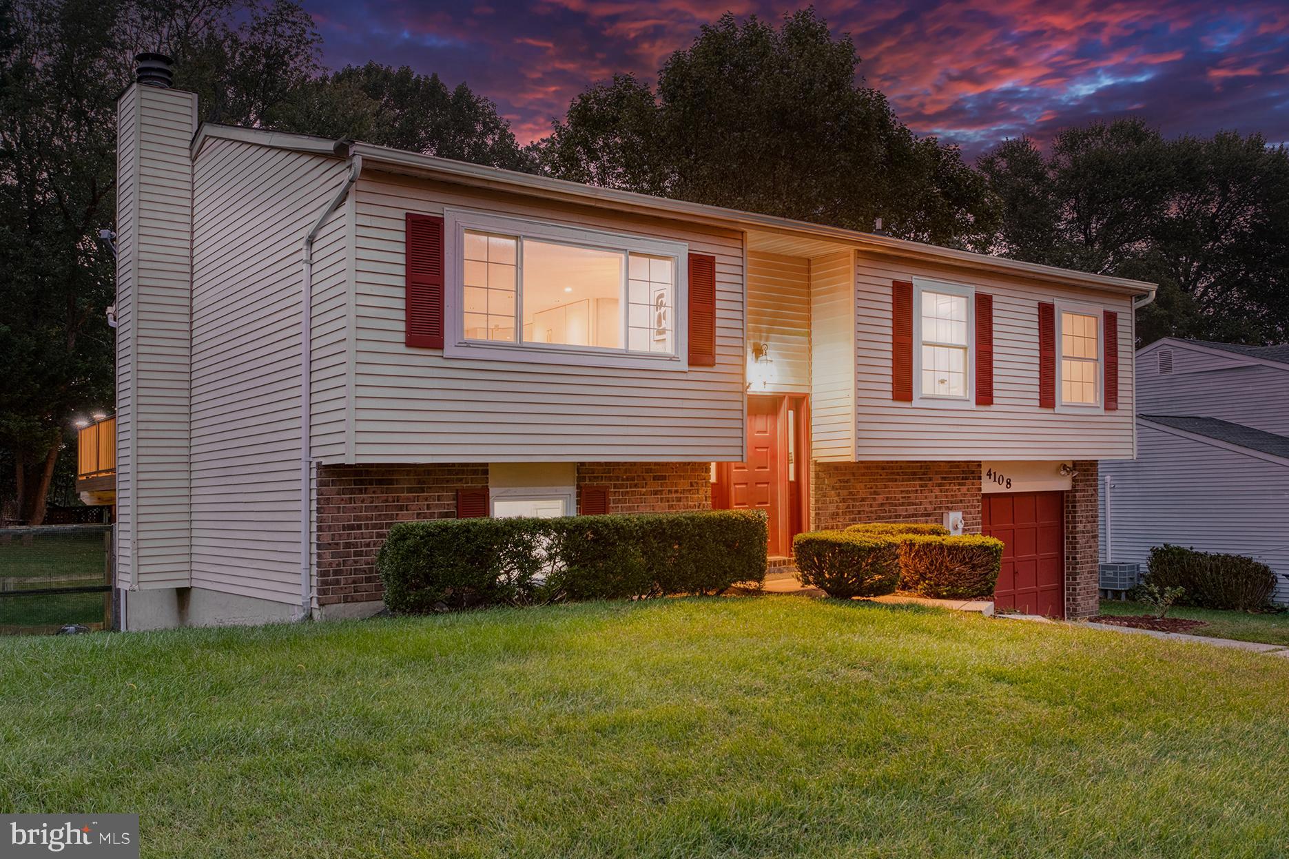 4108 Century Towne Road Randallstown, MD 21133 - Photo 46 of 51 a front view of a house with a garden