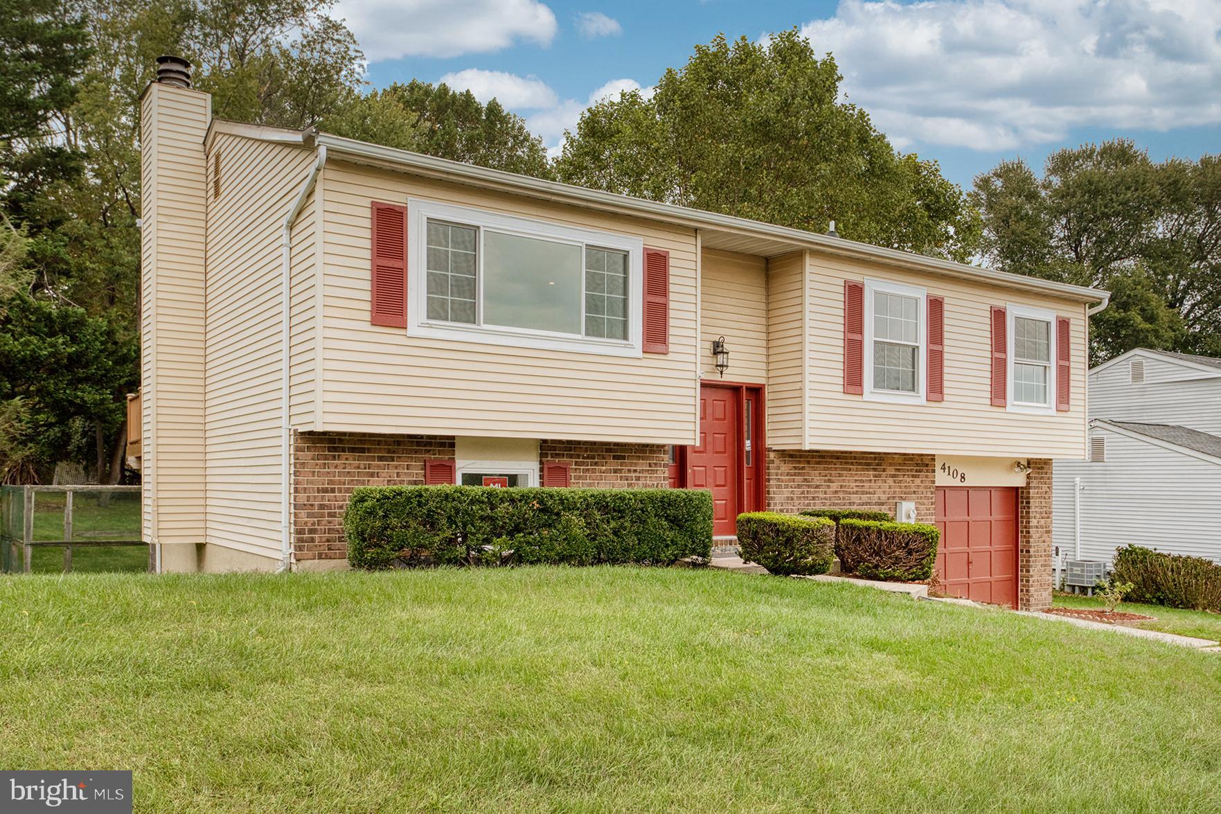 4108 Century Towne Road Randallstown, MD 21133 - Photo 47 of 51 a front view of a house with a yard