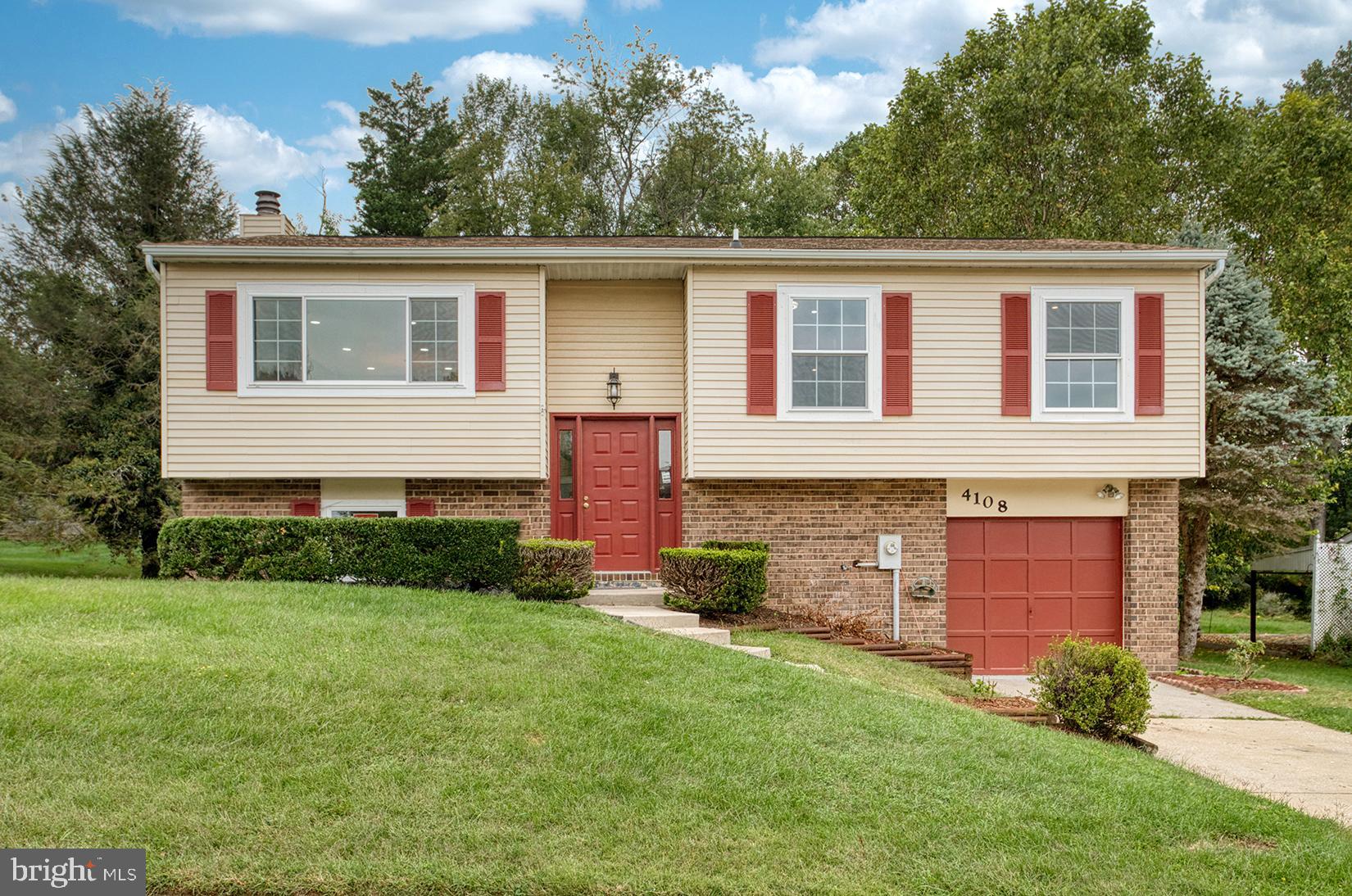 4108 Century Towne Road Randallstown, MD 21133 - Photo 49 of 51 a view of a house with a yard and plants