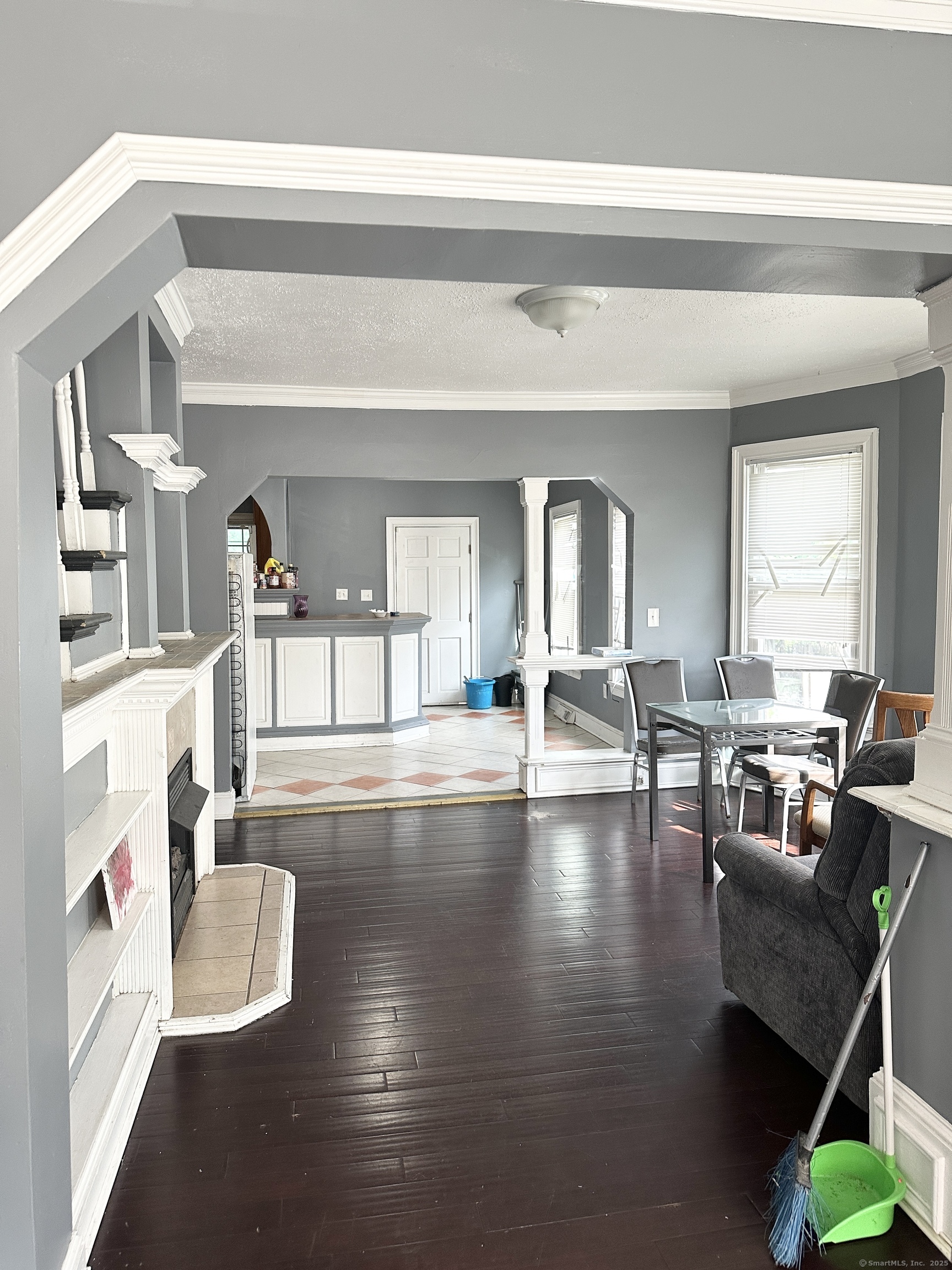 49 Prospect Street Meriden, CT 06451 - Photo 6 of 11 a view of a living room and dining room