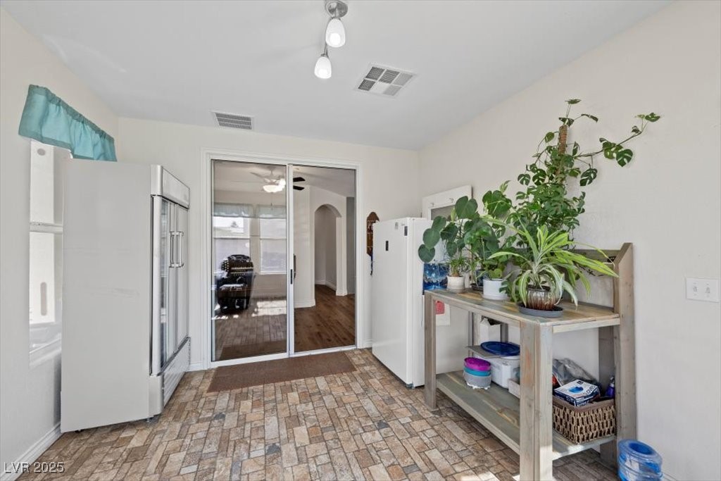 249 Cinnamon Ridge Way Henderson, NV 89015 - Photo 50 of 76 Sunroom just off of the kitchen and dining rm area this room is a beautiful all season rm.