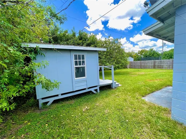a view of a backyard with a garden
