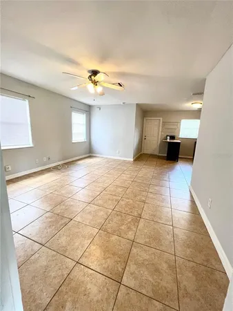 a view of a livingroom with a staircase