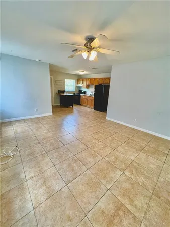 a view of a kitchen with furniture and a fireplace
