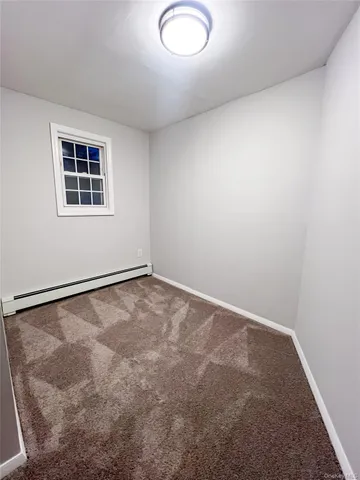 an empty room with a workbench