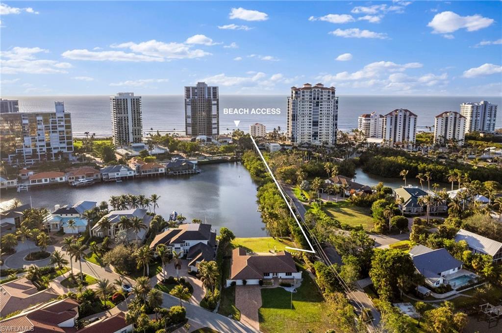 319 Pirates Bight Naples, FL 34103 - Photo 3 of 26 a view of a city