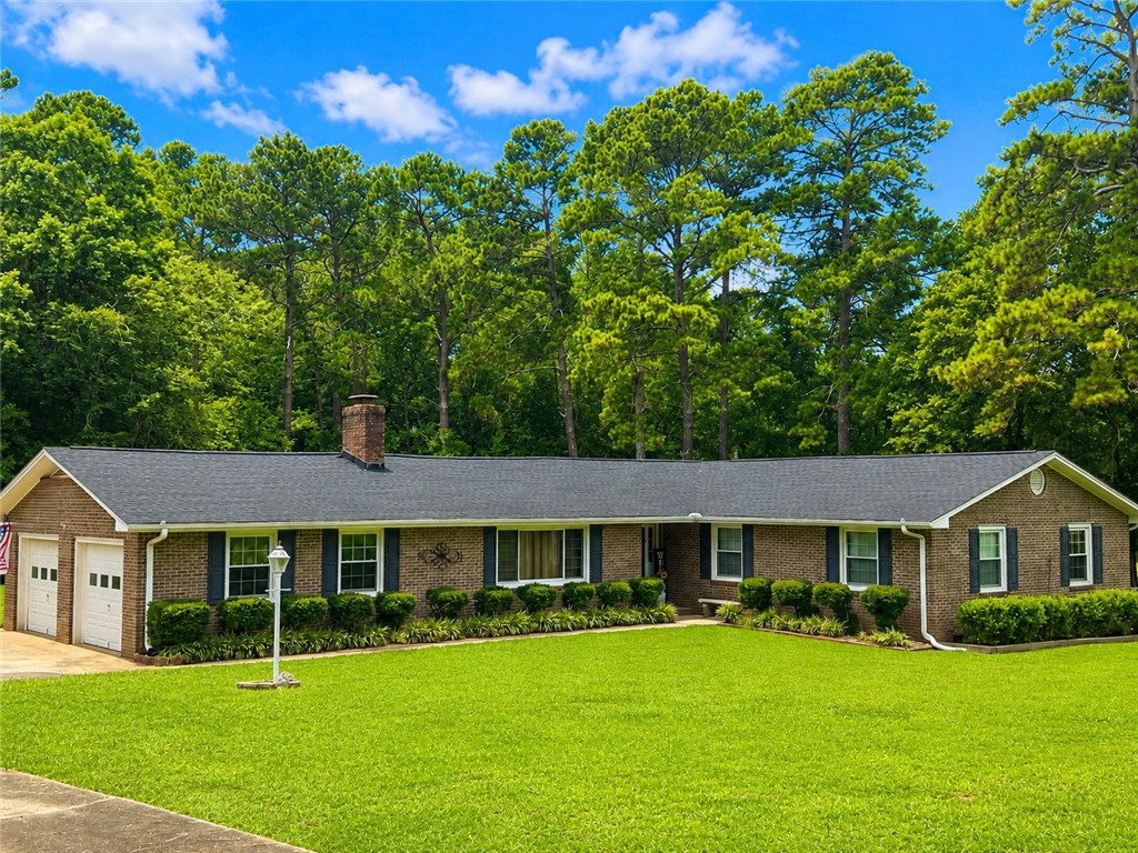 307 Mar-Mac Road Anderson, SC 29626 - Photo 1 of 19 A well-maintained brick ranch home with an attached 2 car garage and a neatly manicured lawn.