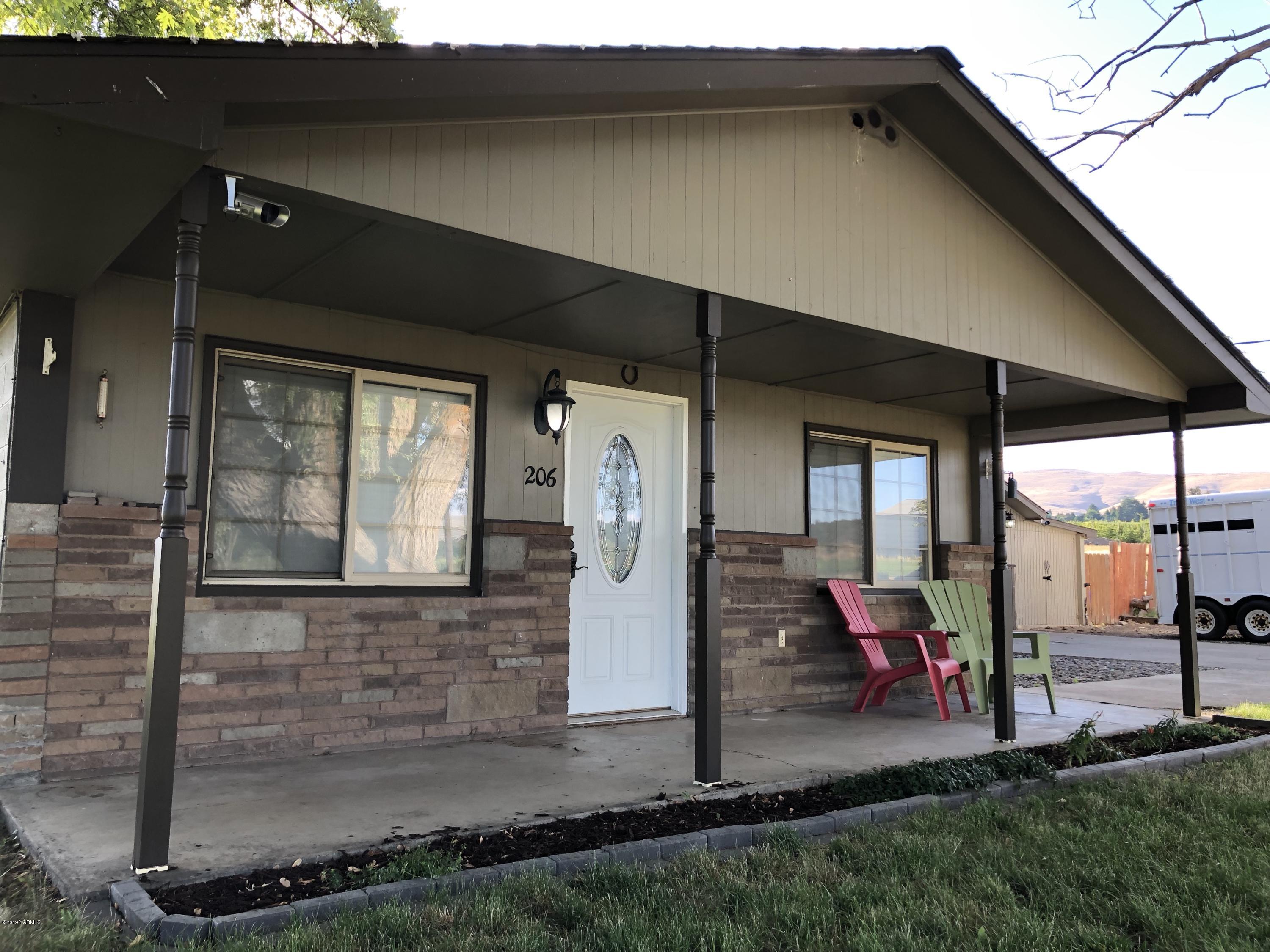 206 Hunziker Road Yakima, WA 98908 - Photo 1 of 28 a view of outdoor space and porch